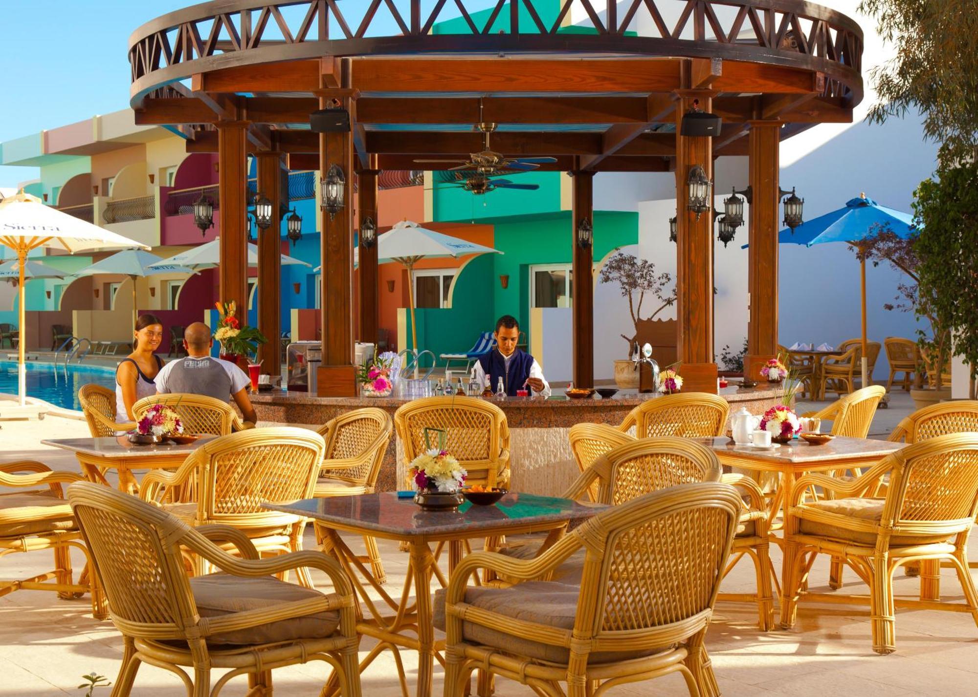 Sierra Sharm El Sheikh Hotel Exterior photo The pool bar at the Hilton Sharm El Sheikh