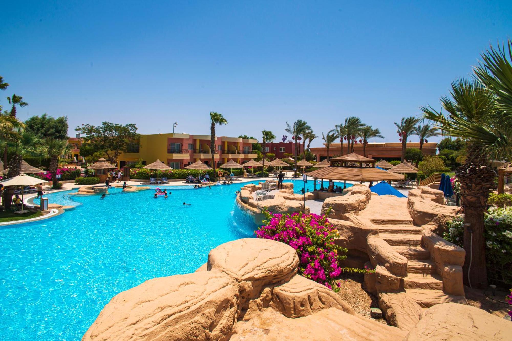 Sierra Sharm El Sheikh Hotel Exterior photo A swimming pool at a resort in Egypt