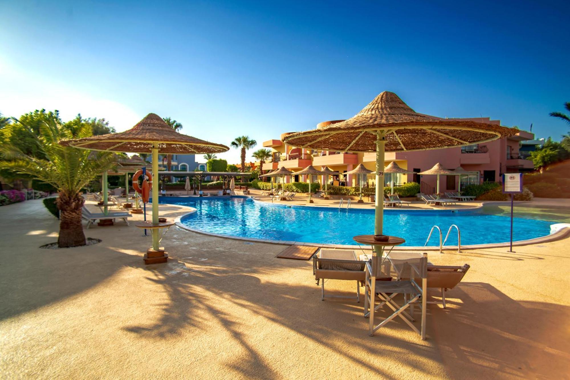Sierra Sharm El Sheikh Hotel Exterior photo A pool at a resort in Egypt